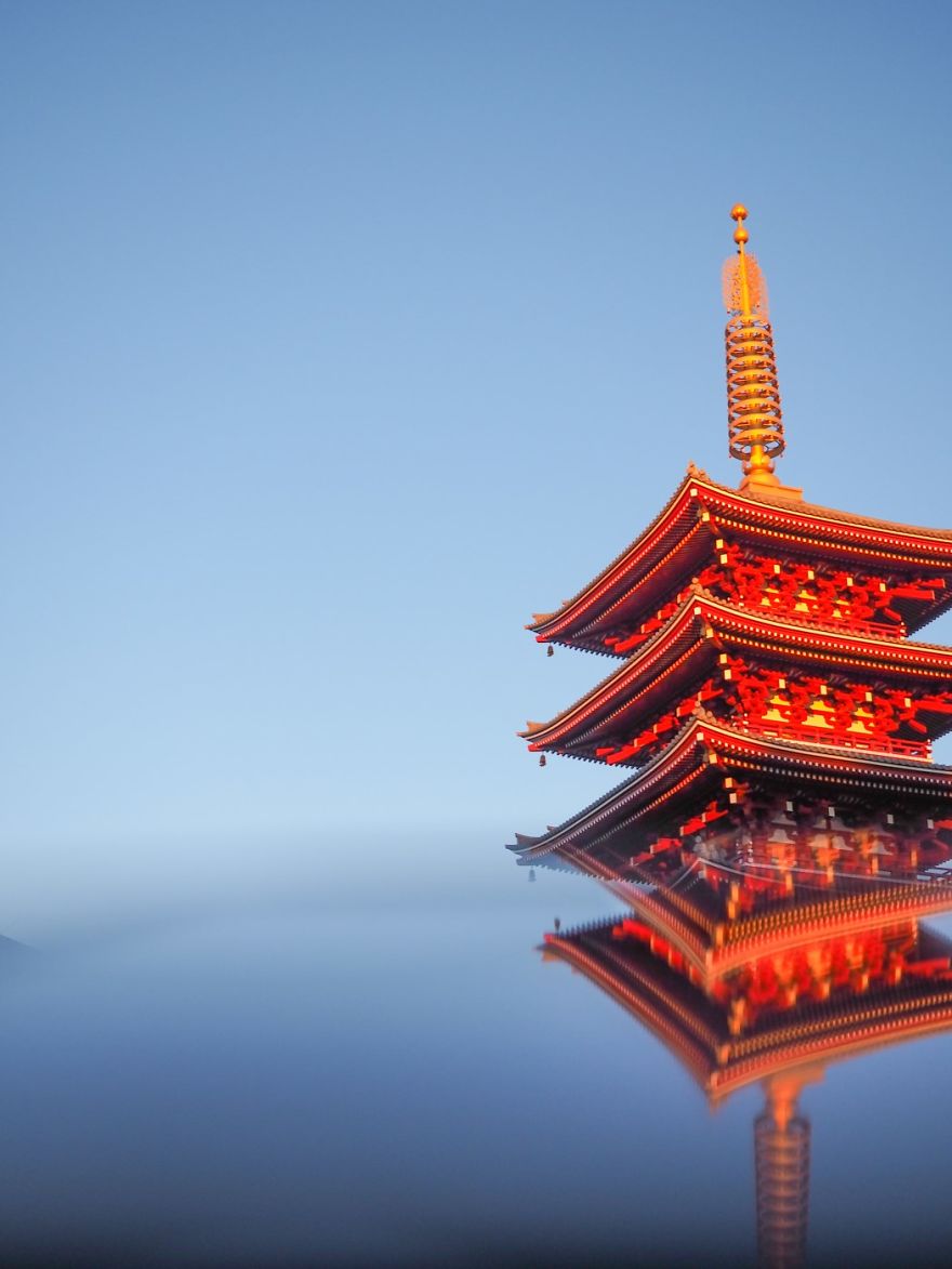 With the golden light of sunrise bouncing off the pagoda at Senso-ji Temple in Tokyo, Japan, I lifted my phone up to double the effect.