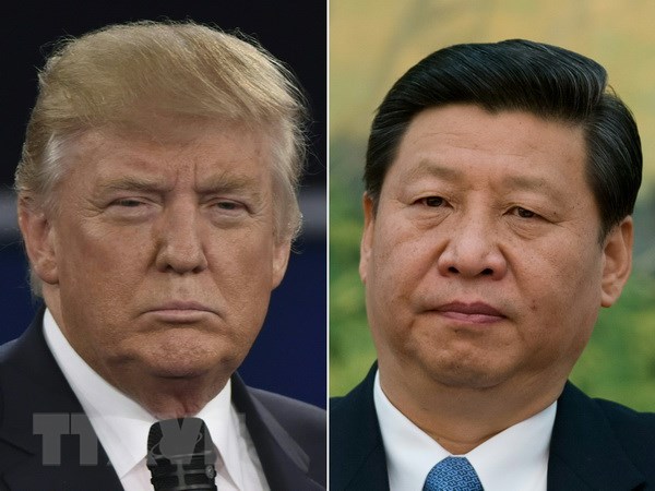 Tổng thống Mỹ Donald Trump (trái) và Chủ tịch Trung Quốc Tập Cận Bình (phải). (Nguồn: AFP/TTXVN)