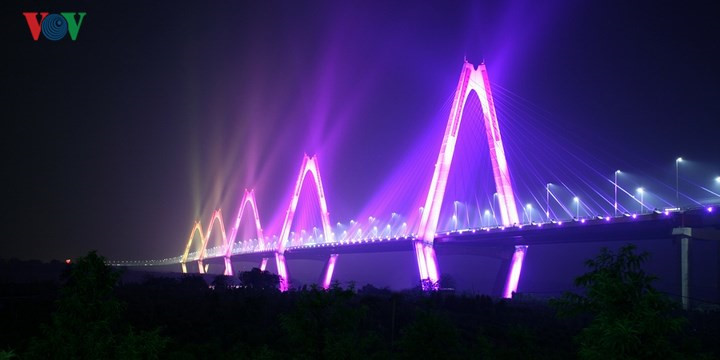 Nhat Tan Bridge, also known as the Vietnam - Japan Friendship Bridge, was inaugurated in January 2015. It is the first cable-stayed bridge in Hanoi, having a total length of 8.9km (5.5 miles) with five spans over the Red River, which represent the capital city's five ancient gates. It is outfitted with 25,000 LED lights displaying a variety of  ever-changing colourful designs.