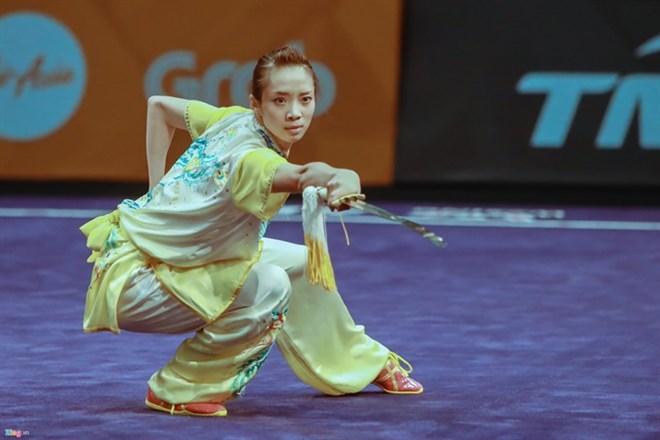 Vietnam's defending champion of wushu in Asiad 2014 Duong Thuy Vy will compete in jianshu (sword) and qiangshu (spear) events in ASIAD 2018. (Photo: news.zing.vn)