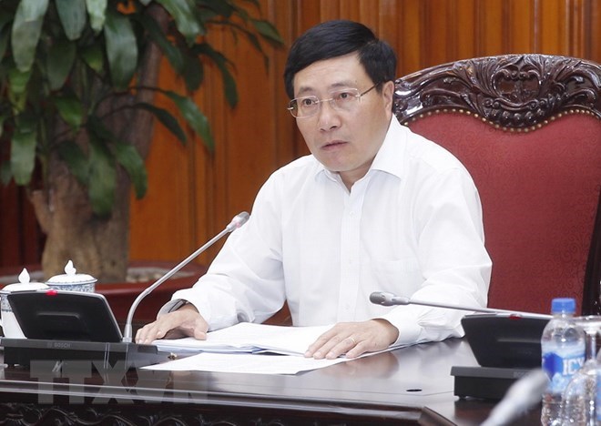 Deputy Prime Minister Pham Binh Minh at the meeting 