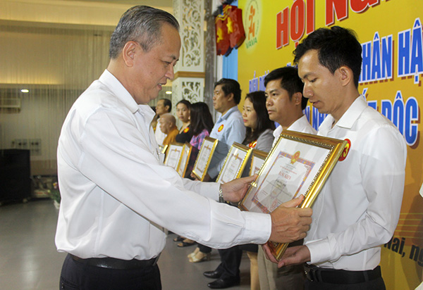 Joining hands in caring for AO/dioxin victims