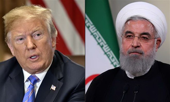 Tổng thống Iran Hassan Rouhani (phải) và Tổng thống Mỹ Donald Trump. (Ảnh: AFP/TTXVN)