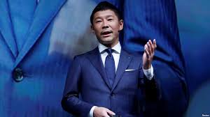 Yusaku Maezawa, the chief executive of Zozo, which operates Japan's popular fashion shopping site Zozotown and is officially called Start Today Co, speaks at an event launching the debut of its formal apparel items, in Tokyo, Japan, July 3, 2018. 