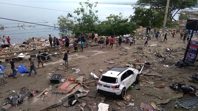 Hiện trường ngổn ngang, đổ nát sau khi sóng thần ập vào Palu, đảo Sulawesi, Indonesia ngày 29-8-2018. (Ảnh: AFP/TTXVN)