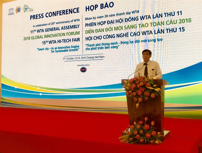 Lai Xuân Thành, director of Bình Dương Province’s Department of Information and Communications, speaks at a press conference held yesterday in the province. 