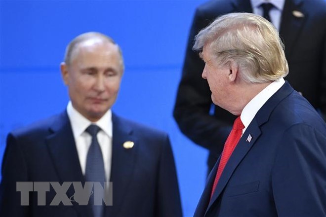 Tổng thống Nga Vladimir Putin (trái) và Tổng thống Mỹ Donald Trump tại Hội nghị thượng đỉnh Nhóm các nền kinh tế phát triển và mới nổi hàng đầu thế giới (G20) diễn ra ở thủ đô Buenos Aires, Argentina ngày 30-11-2018. (Ảnh: AFP/ TTXVN)