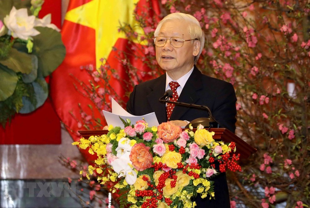 Party General Secretary and State President Nguyen Phu Trong extended Lunar New Year wishes to revolutionary veterans, leaders and former leaders of the Party and State, representatives from Fatherland Front, ministries and sectors at the Presidential Palace in Hanoi on Feb. 1.