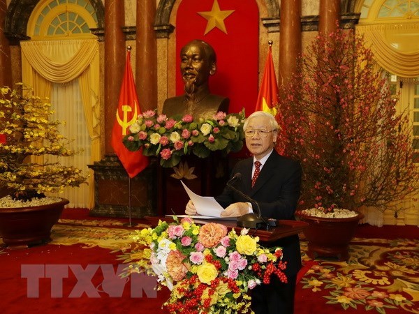 Party General Secretary and President Nguyen Phu Trong offers Tet greetings at the get-together in Hanoi on February 1