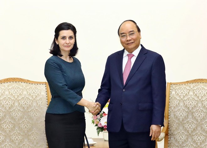 Prime Minister Nguyen Xuan Phuc hosted separate receptions for Bulgarian Ambassador Marinela Petkova and Uruguayan Ambassador Rosario Portell Casanova in Hanoi on March 19.