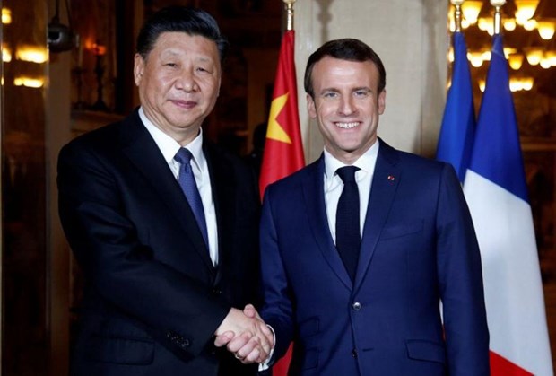 Tổng thống Pháp Emmanuel Macron và Chủ tịch Trung Quốc Tập Cận Bình. (Nguồn: AFP)