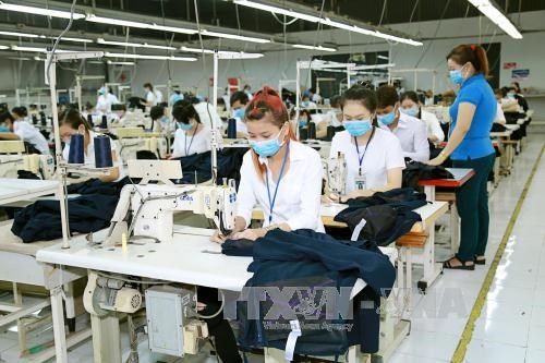 Workers at a garment-textile factory