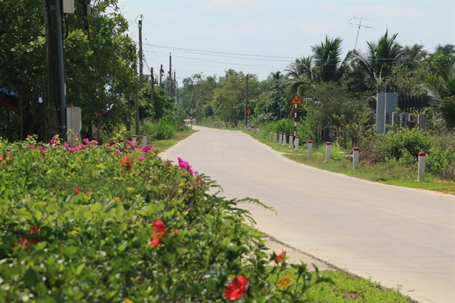 A road has been cemented and beautified in Định Quán District’s Gia Canh Commune, Đồng Nai Province. – VNA/VNS Photo Sỹ Tuyên  Read more at http://vietnamnews.vn/society/518955/rural-district-in-dong-nai-province-gets-a-well-deserved-makeover.html#WvJdxeJXMfAUeOPw.99