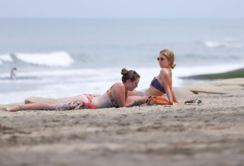 Tourists sunbathe at Cua Dai Beach in the central town of Hoi An. Photo by VnExpress/Nguyen Dong