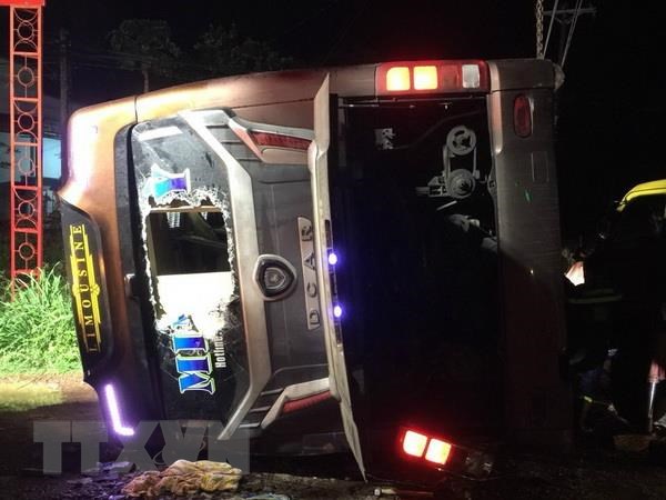 Coach flips on side, killing two and injuring 17