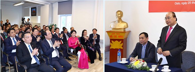 Prime Minister Nguyen Xuan Phuc (right photo, standing) speaks at the meeting with Vietnamese expats in Norway.