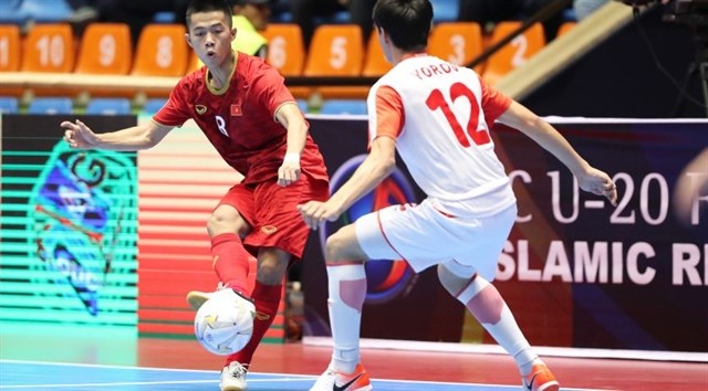 Vietnam comes from behind to defeat Tajikistan 2-1 in the group stage and book a place in the quarter-finals of the AFC U-20 Futsal Championships in Iran. (Photo: vff.org.vn)