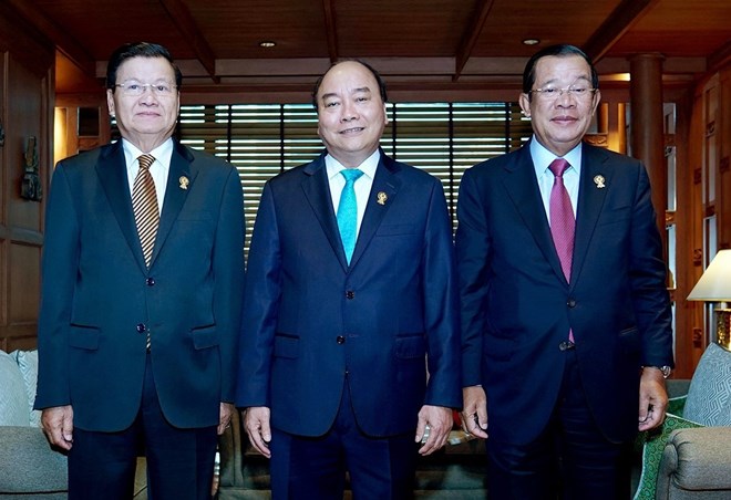 From left: Lao Prime Minister Thongloun Sisoulith, Vietnamese PM Nguyen Xuan Phuc and Cambodian PM Hun Sen before the working session in Bangkok on June 23