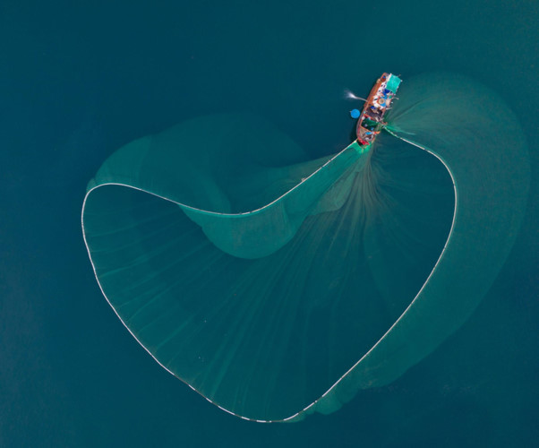 A stunning view of a large fishing net captured from a birds-eye view