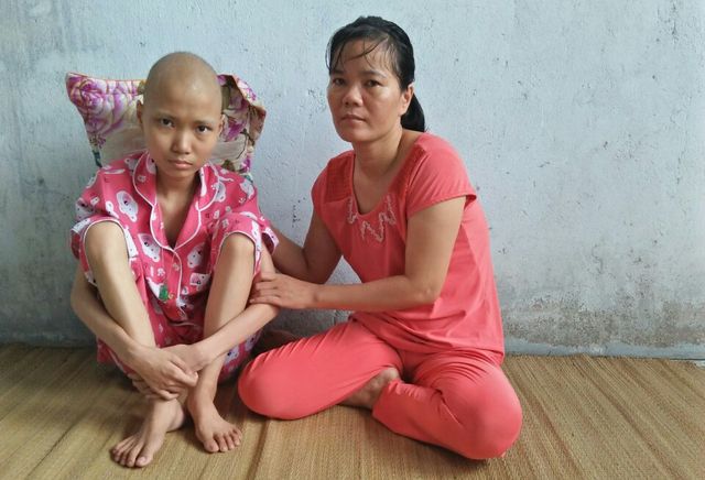 Nguyen Thi Chinh (right) and her daughter