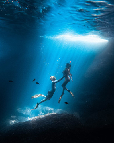   Compassion, friendship, family, love, and loss all feature among the photos which depict the universal feeling of "love", the topic of the #Love2019 photo contest. This photo was among the Top 50 and is known as 'Magical moments'. It was snapped among fish in the clear seas of Menorca, Spain.