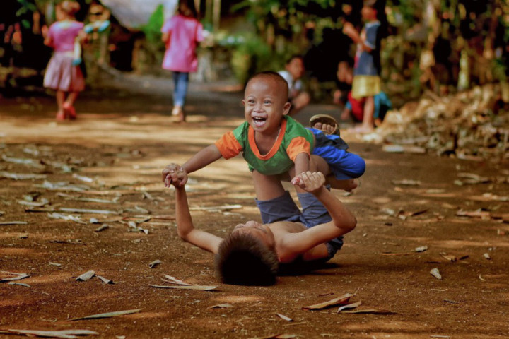  One minute later, they could well be fighting, but this photo titled Brotherhood in Indonesia captures a loving moment between two siblings.