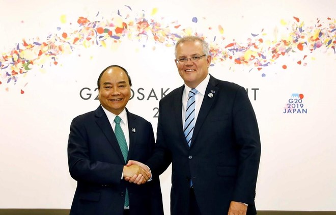 Prime Minister Nguyen Xuan Phuc (left) and his Australian counterpart Scott Morrison during G20 Summit in Japan in June 2019. 