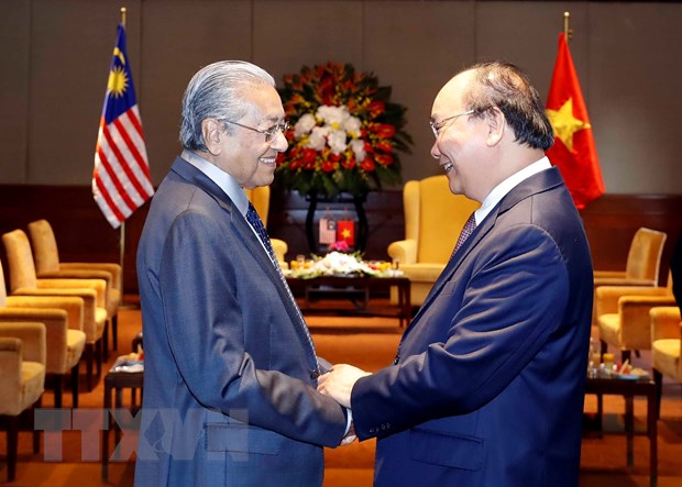 Thủ tướng Nguyễn Xuân Phúc và Thủ tướng Malaysia Mahathir Mohamad. (Ảnh: Thống Nhất/TTXVN)