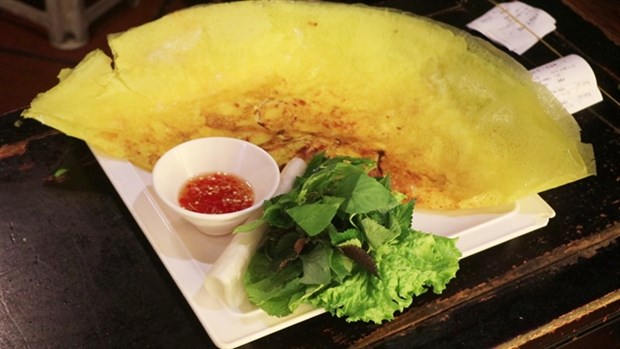 'Banh xeo’ (savoury filled pancakes) is a popular dish in the south and centre of Vietnam. (Photo: VNS)