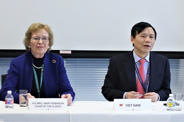 Ambassador Dang Dinh Quy, head of the Vietnamese permanent mission to the United Nations (R), chairs the event.