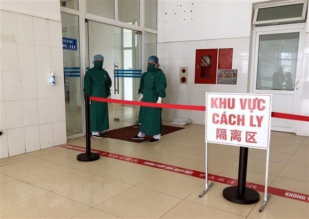 Medical workers at an isolation area (Source: VNA)