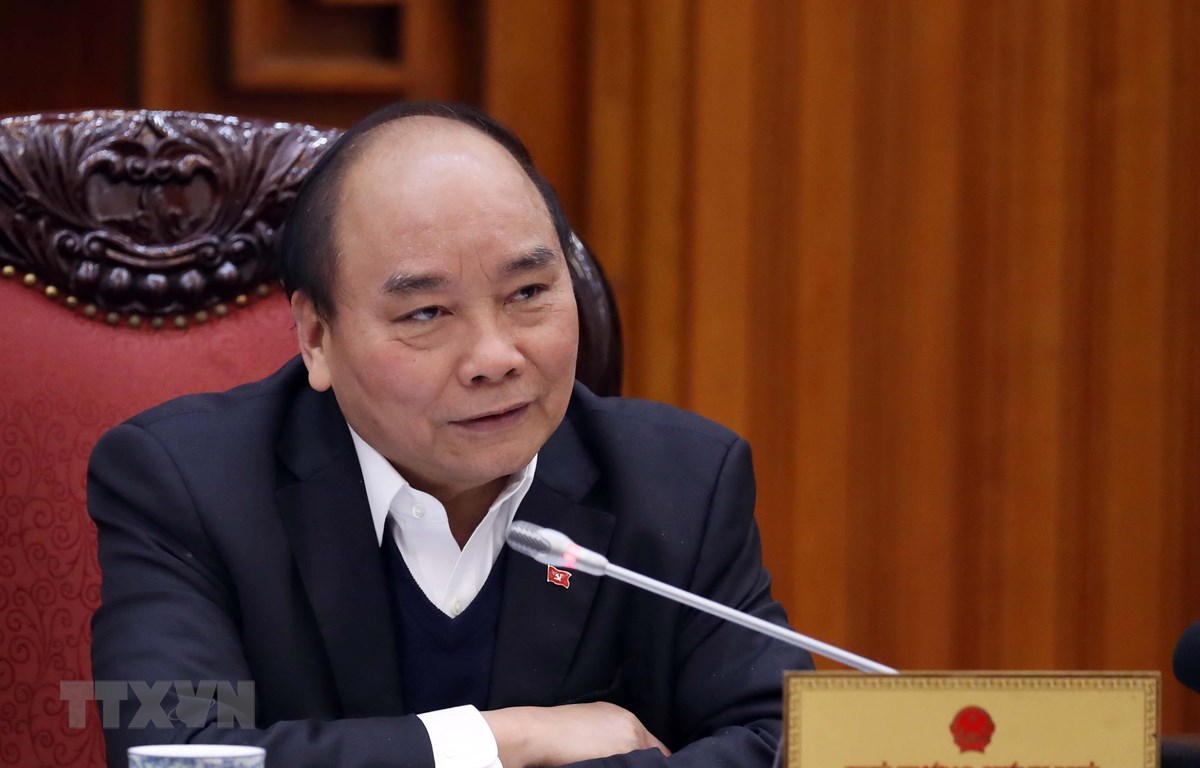 Thủ tướng Nguyễn Xuân Phúc chủ trì họp Thường trực Chính phủ tìm các giải pháp nhằm tháo gỡ khó khăn cho ngành mía đường. (Ảnh: Thống Nhất/TTXVN)