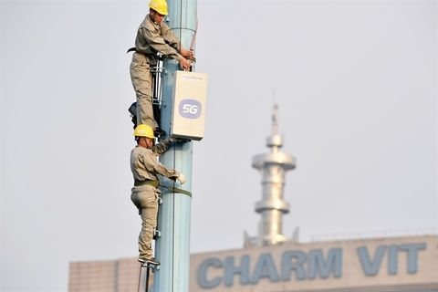 Workers on a base transceiver station (BTS).