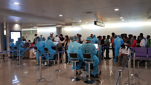 Filling out the medical declaration form at Tan Son Nhat International Airport