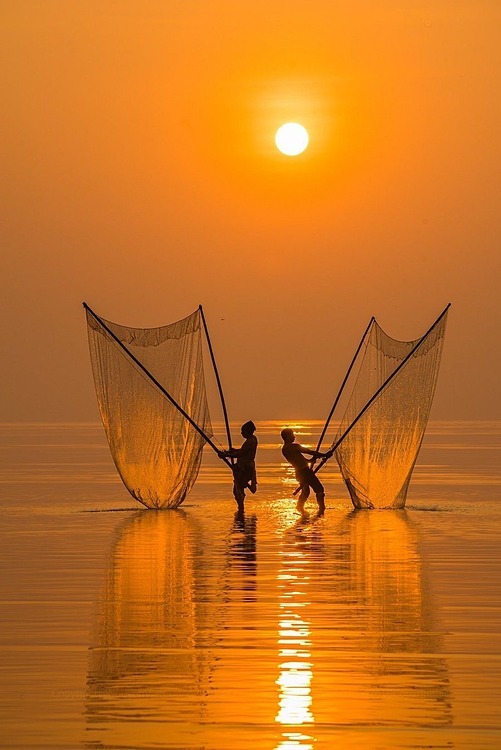 Nguyen Viet Cuong captures two men pulling out their fishing nets on Quang Beach in the northern province of Thai Binh. He said: "Vietnam has a long coastline of 3,260 km, excluding its islands. Vietnamese people mainly stick to their seas with a rich variety of fish stock from the north to the south. In order to capture this scene, my friends and I woke up at 4 am and walked around two kilometers to the beach to wait for the sunrise and the fishermen to start their work."