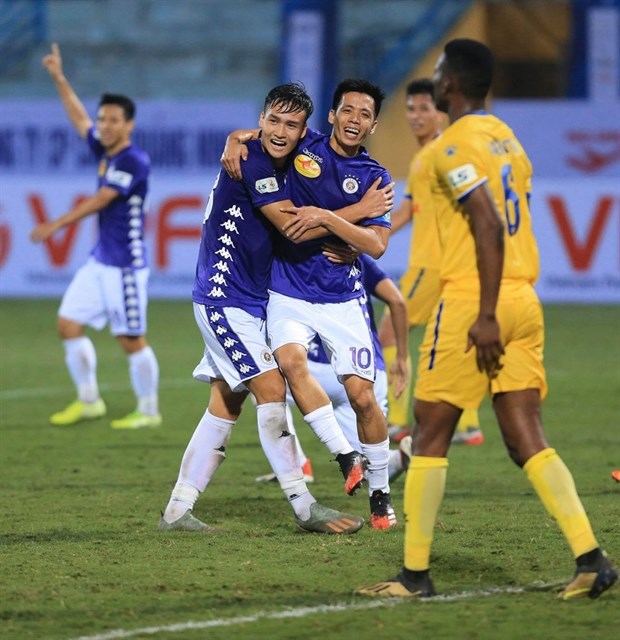 Hanoi FC players during a 2020 V.League 1 match. The team has lost the chance to compete at the ASEAN Club Championship after the tournament was cancelled. Photo of VPF. (Photo: VNA)