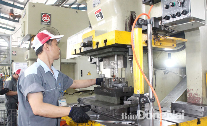 Sản xuất tại Công ty TNHH Công nghiệp Boss ở Khu công nghiệp Sông Mây (H.Trảng Bom). Ảnh: Hương Giang