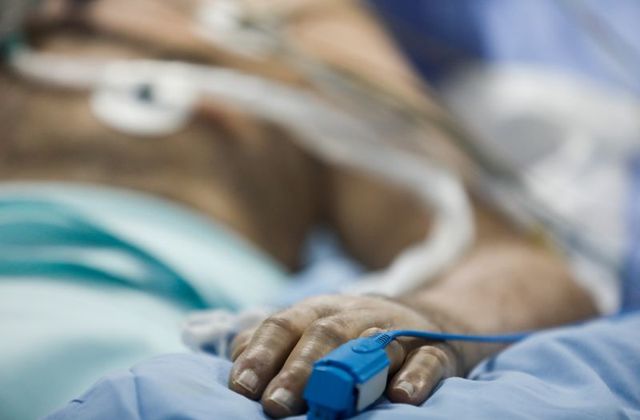 A pulse oximeter is placed on the hand of a patient at the intensive care unit (ICU) of the Sotiria hospital, during the coronavirus disease (COVID-19) outbreak, in Athens, Greece, April 7, 2020. 