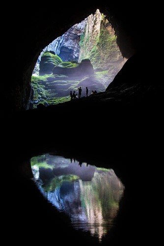 Reflections from a pool situated deep inside Son Doong cave