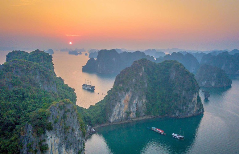 According to the website, the country’s enchanting Ha Long Bay serves as a spectacular sight for visitors and is one of Asia’s great wonders.  “With its towering karst formations, clad in dense forest, the bay has been a UNESCO World Heritage Site for more than 20 years. Usually visitors here can sit back and watch the sunrise at around 5 a.m. in the summer from Ban Chan beach, or from a boat on the water”, Love Exploring states.  (Photo: aksenovden/Shutterstock)