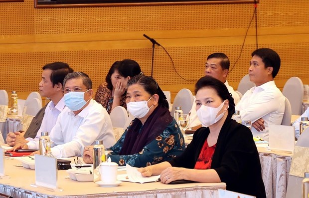 National Assembly Chairwoman Nguyen Thi Kim Ngan (first from right) and Standing Vice Chairwoman Tong Thi Phong (second from right) at the event.