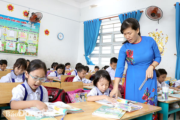 Học sinh lớp 1 Trường tiểu học Nguyễn Thái Học (P.Trảng Dài, TP.Biên Hòa) trong giờ học. 