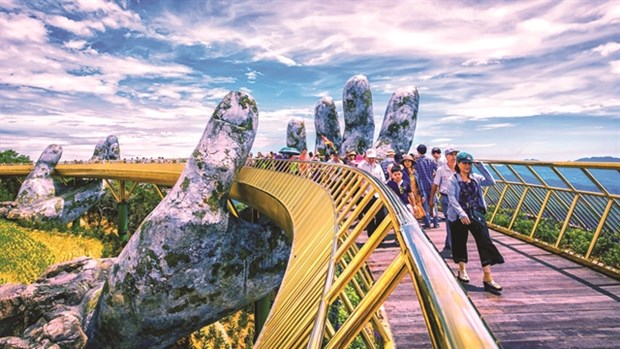 The Golden Bridge in Sun World Ba Na Hills in Da Nang City, which is among 100 top destinations in the world selected by the Time magazine. (Photo: baotintuc.vn)