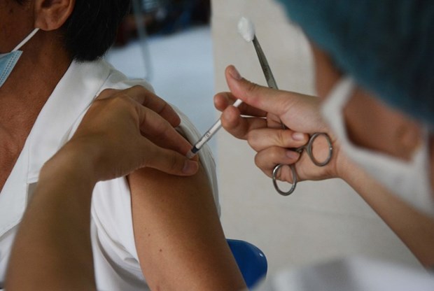 A total 259,736 frontline workers nationwide have received COVID-19 vaccine shots. (Photo: VNA)