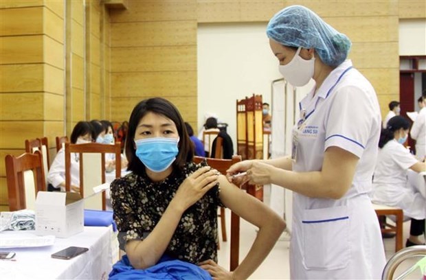 A woman is given COVID-19 vaccine at Lang Son provincial General Hospital. (Photo: VNA)