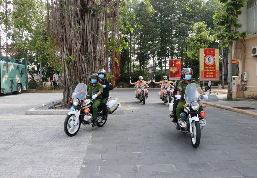 Dong Nai police force participate in the opening ceremony of a campaign ensuring security and order for election day. 