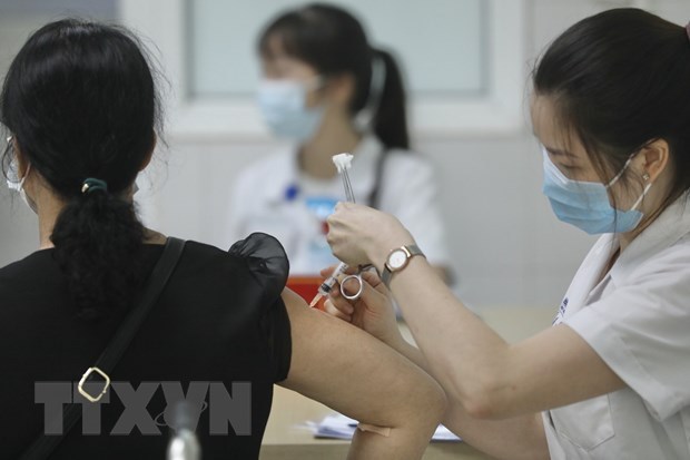 A volunteer gets a Nano Covax vaccine jab.