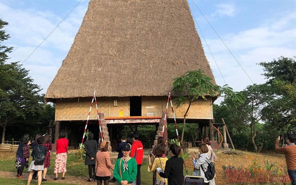 Tourists visit the Vietnam National Villages for Ethnic Culture and Tourism in 2019. (Photo:nhandan.vn)