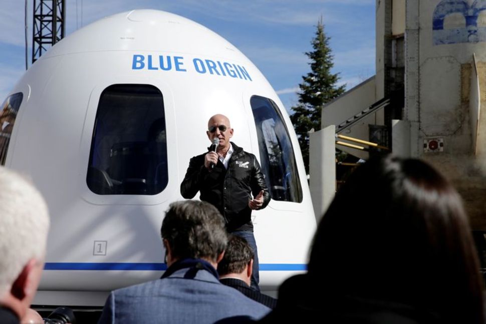 Bezos' Blue Origin to make history with unpiloted civilian space flight