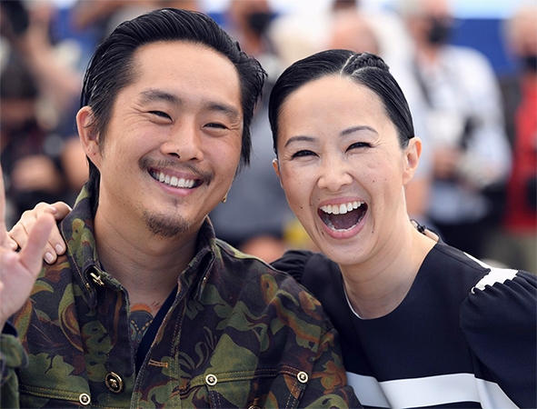 Justin Chon và Phạm Linh Đan tại LHP Cannes ngày 13-7. Ảnh: Reuters